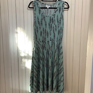 NWOT LulaRoe Nikki Teal with Feathers